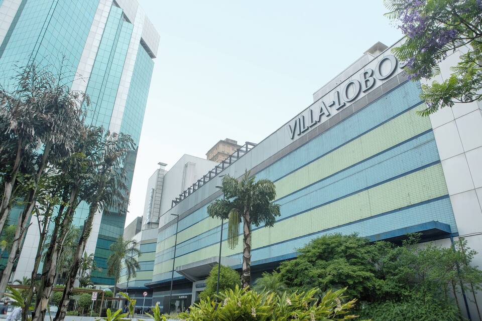 A modern building with the sign "VILLA-LOBO" on its facade.