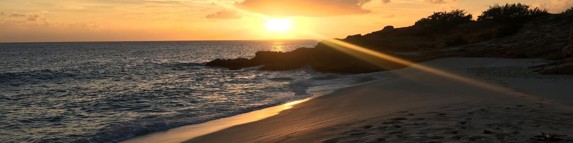 Amazing sunset from one of the only gay nude beach in the Caribbean.