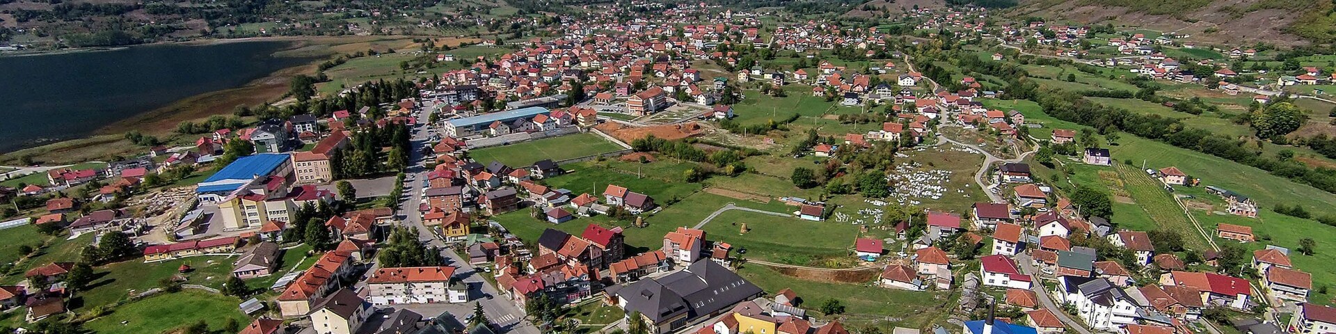 Aerial view of Plav lake and Plav town, Montenegro