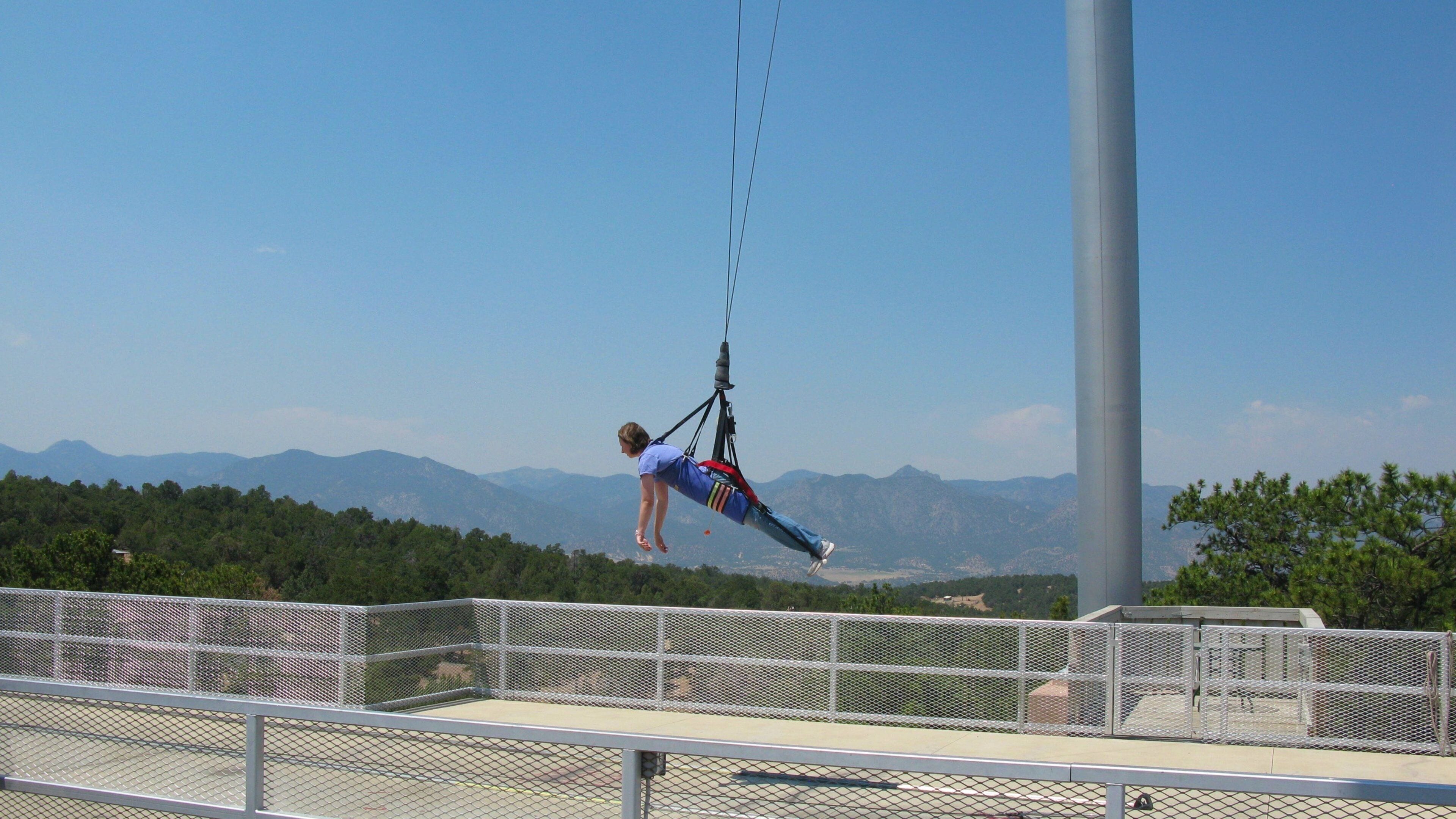 Colorado Springs showing zip lining as well as an individual male