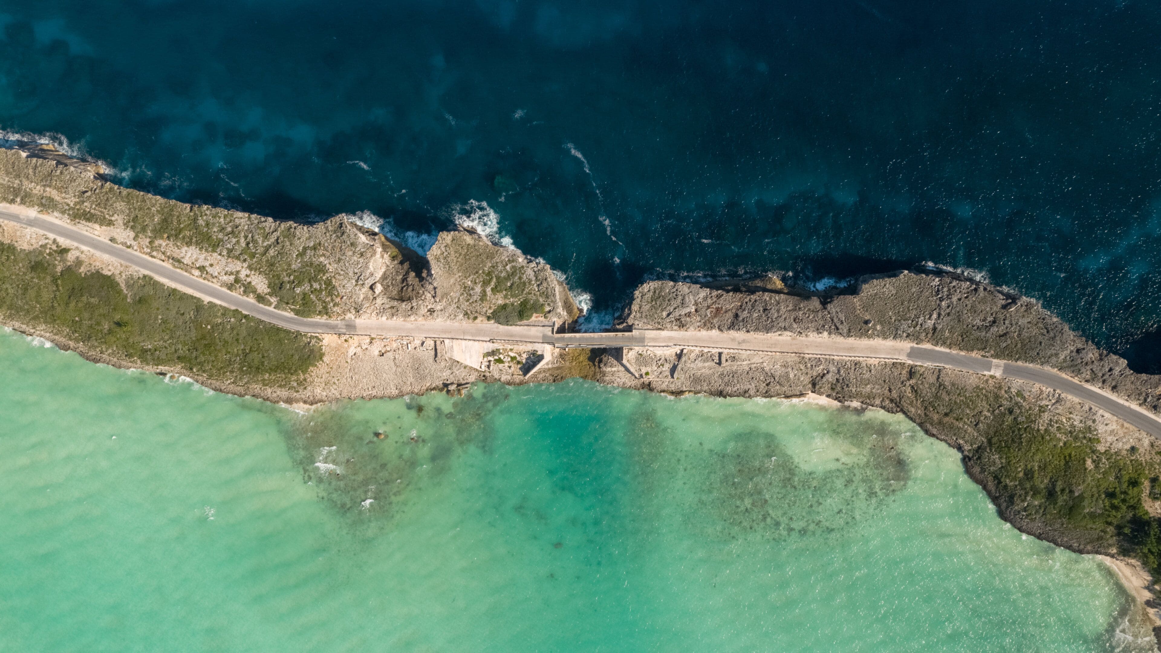 Glass Window Bridge which includes rugged coastline and general coastal views