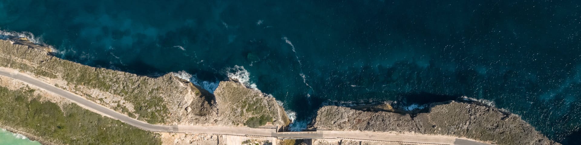 Glass Window Bridge which includes rugged coastline and general coastal views