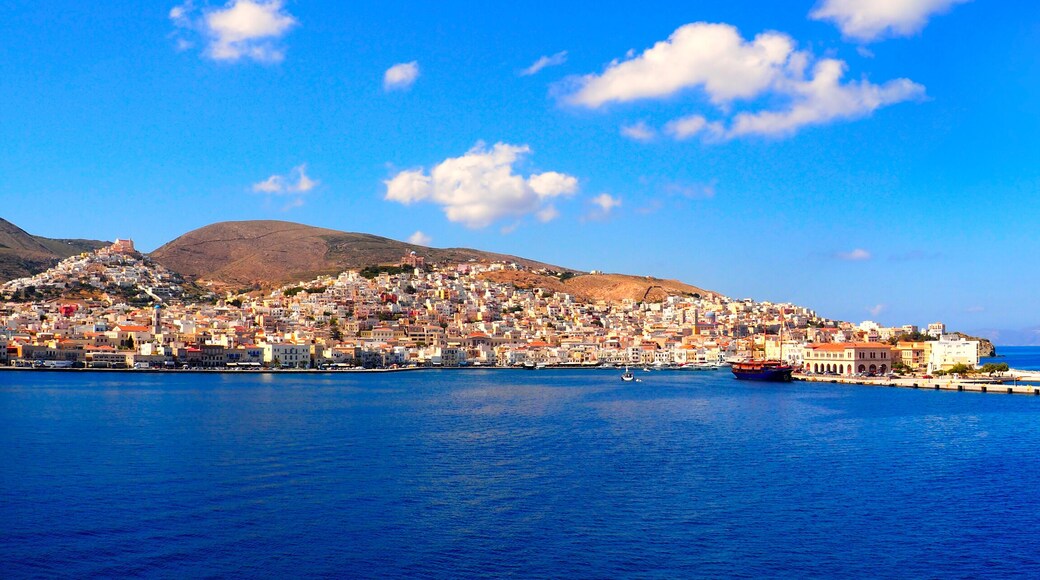 superb panoramic view of the port of Tinos, magnificent Cyclades island in the heart of the Aegean Sea, dominated by the Panaghia Evangélistria Church