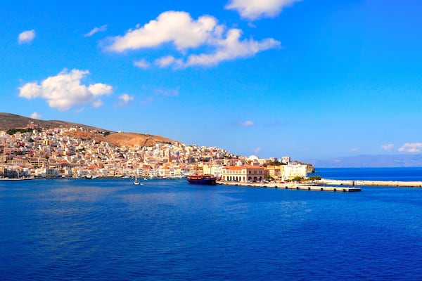 superb panoramic view of the port of Tinos, magnificent Cyclades island in the heart of the Aegean Sea, dominated by the Panaghia Evangélistria Church