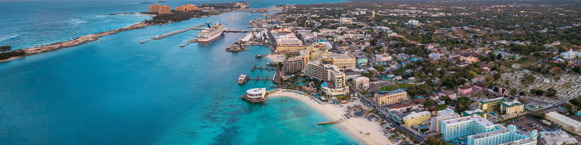 Aerial sunset view of Nassau town and harbour with Junkanoo beach at the Western Esplanade, New Providence, The Bahamas