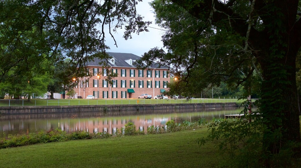 New Iberia which includes a garden and a river or creek