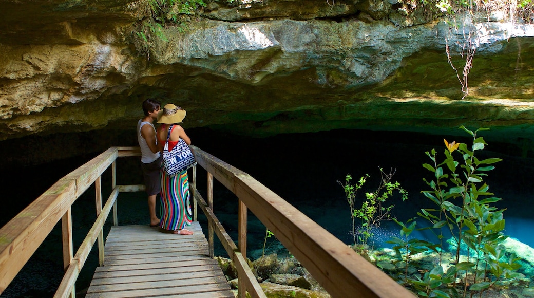 Ben\'s Cave featuring views as well as a couple