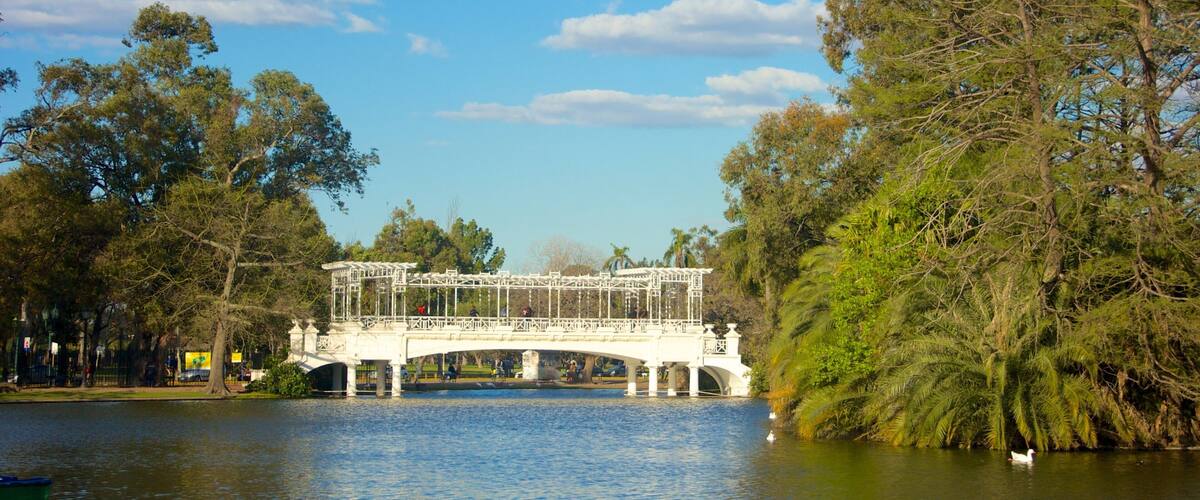 The Rose Garden which includes a bridge and a pond