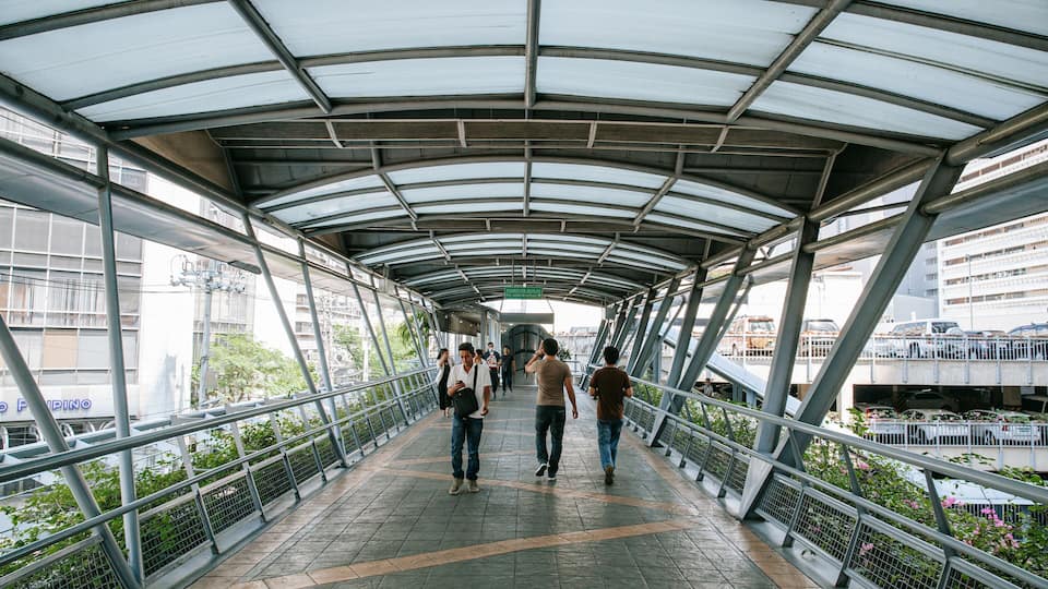 Makati Central Business District showing street scenes and a bridge