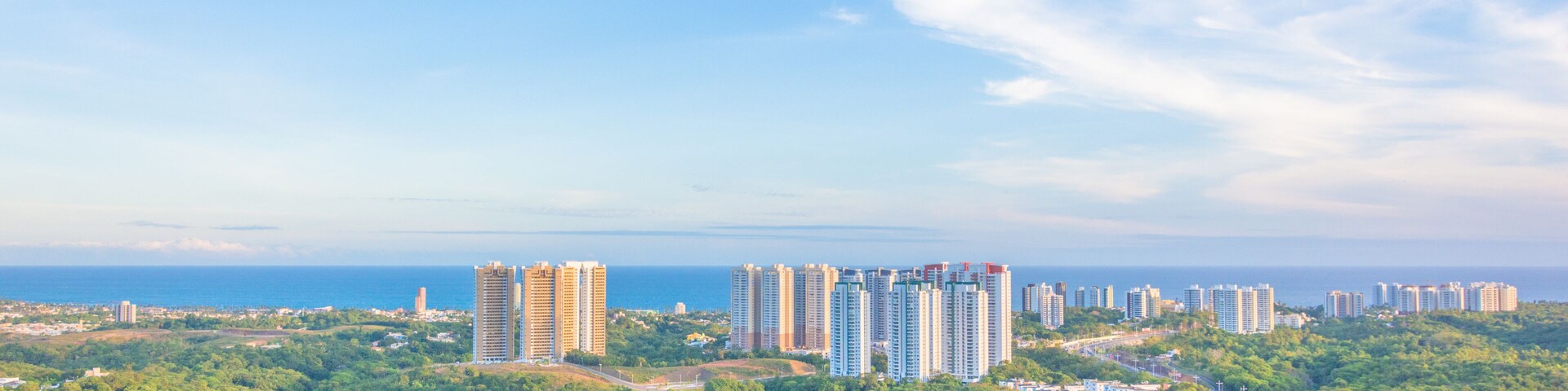 aerial view of the neighborhood of patamares in the city of salvador bahia brazil on a beautiful sunny day at dusk.