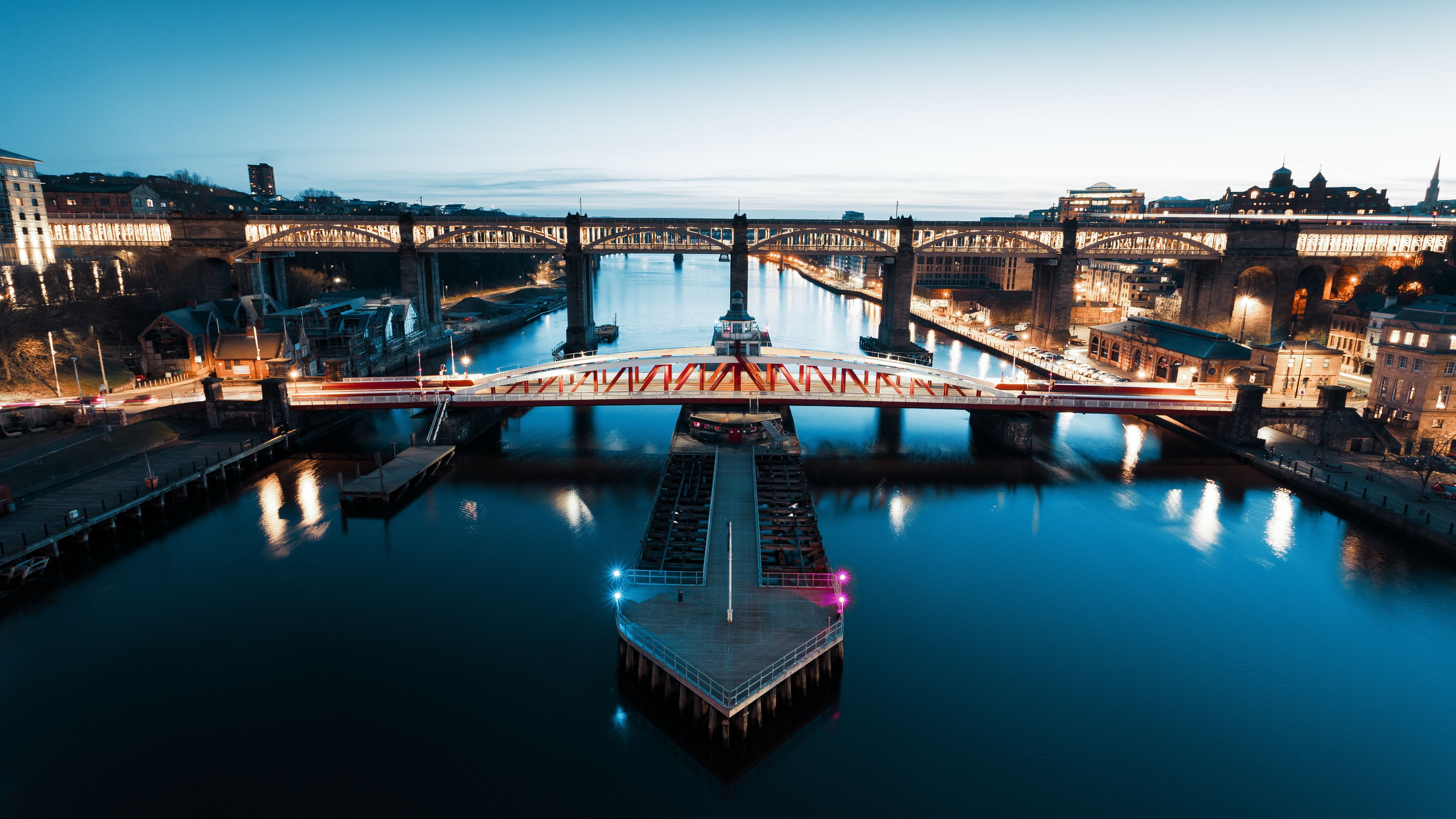 Newcastle upon Tyne UK: 16th March 2021: View of the Quayside (Swing Bridge and High Level Bridge) on the Newcastle Skyline at dusk
