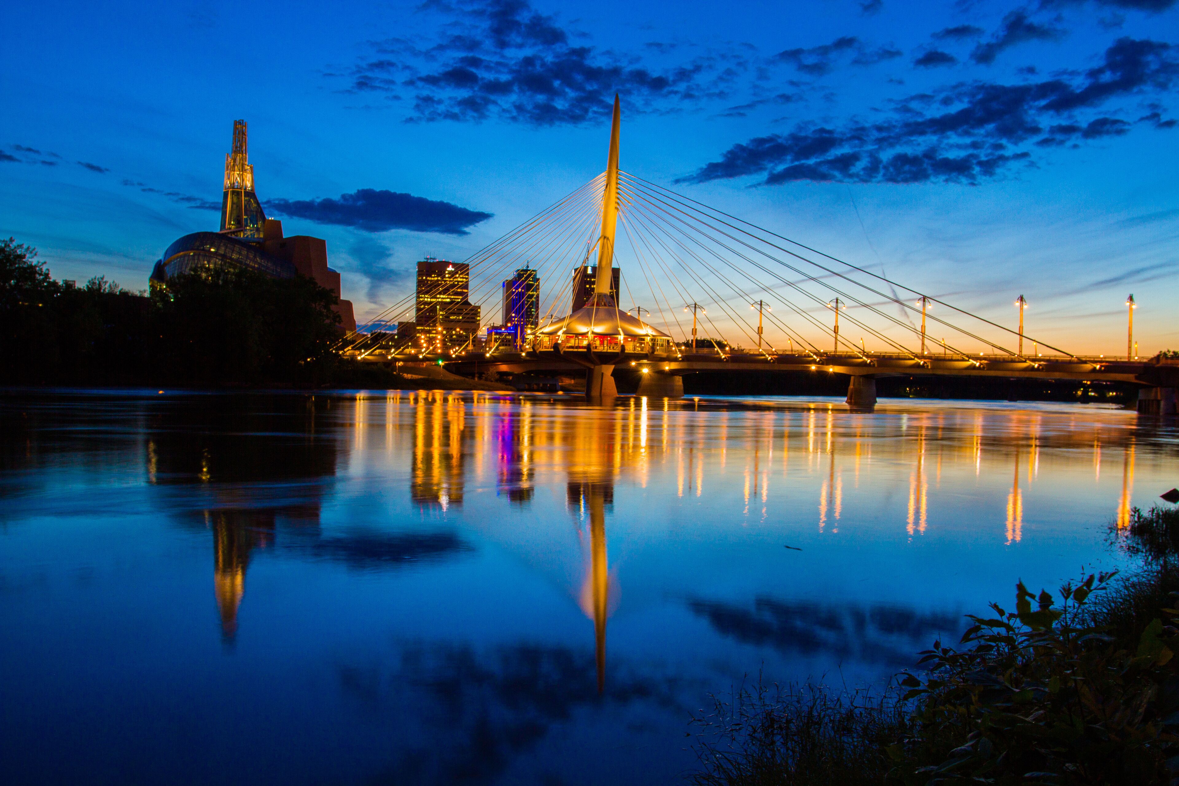 Iconic bridge at night gracing the Winnipeg downtown skyline
