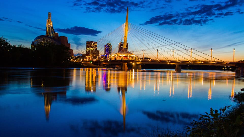 Iconic bridge at night gracing the Winnipeg downtown skyline