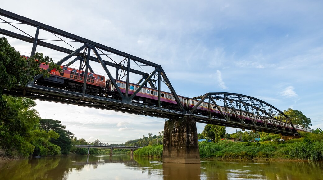 The historic railway bridge crossing the Lang Suan River.