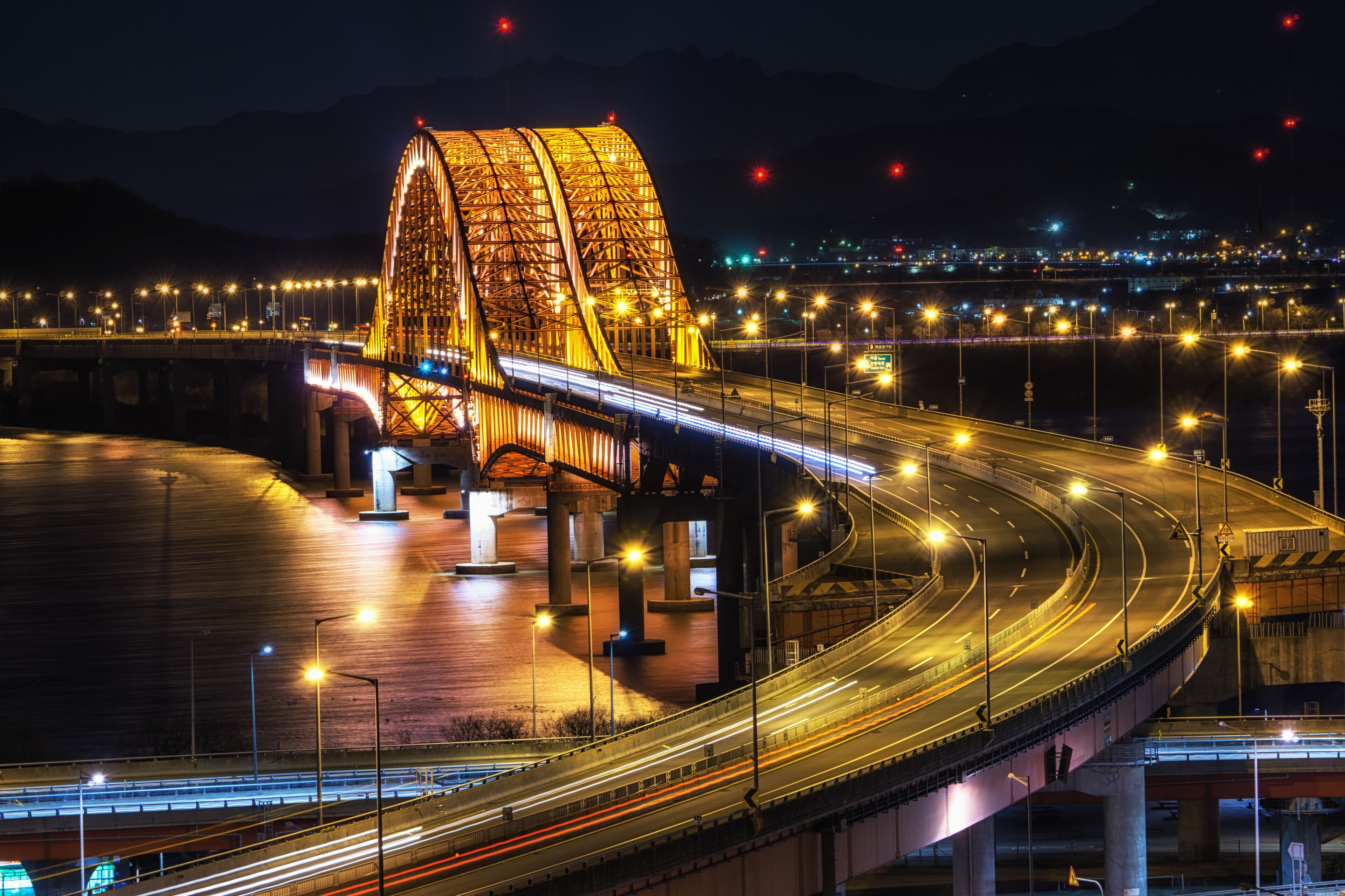 banghwa bridge at night over han river