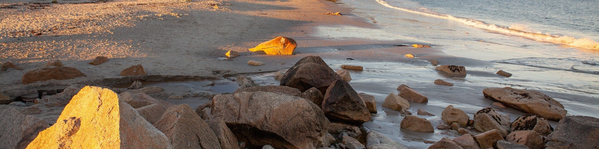 Crystal Crescent Beach featuring general coastal views, a sandy beach and a sunset