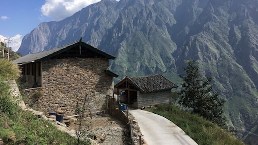A local house along our hike at Haba Snow Mountains #instone