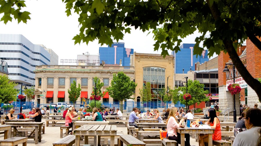 Covent Garden Market which includes outdoor eating and a city as well as a large group of people