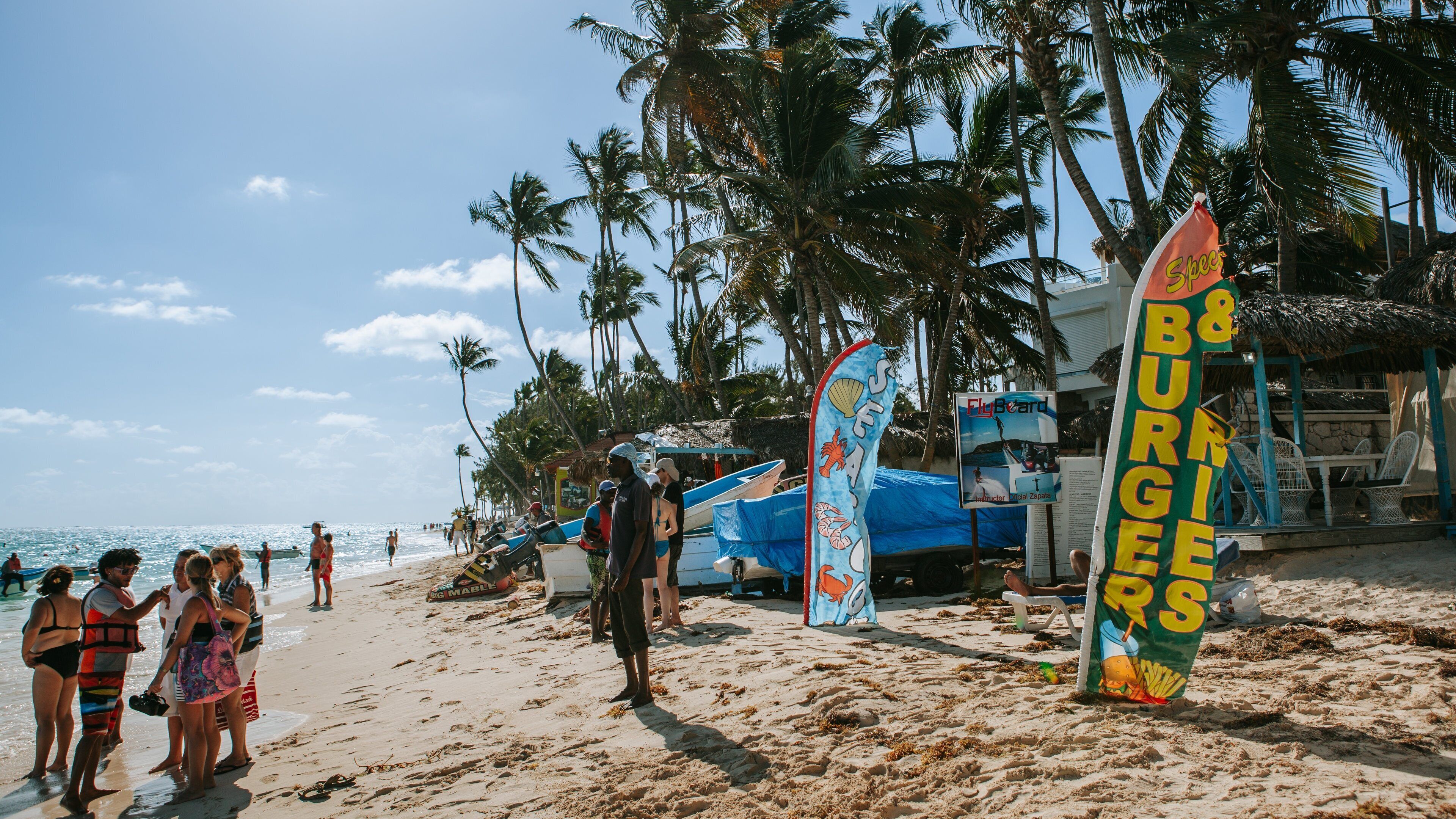 Cortecito Beach which includes tropical scenes, general coastal views and a beach