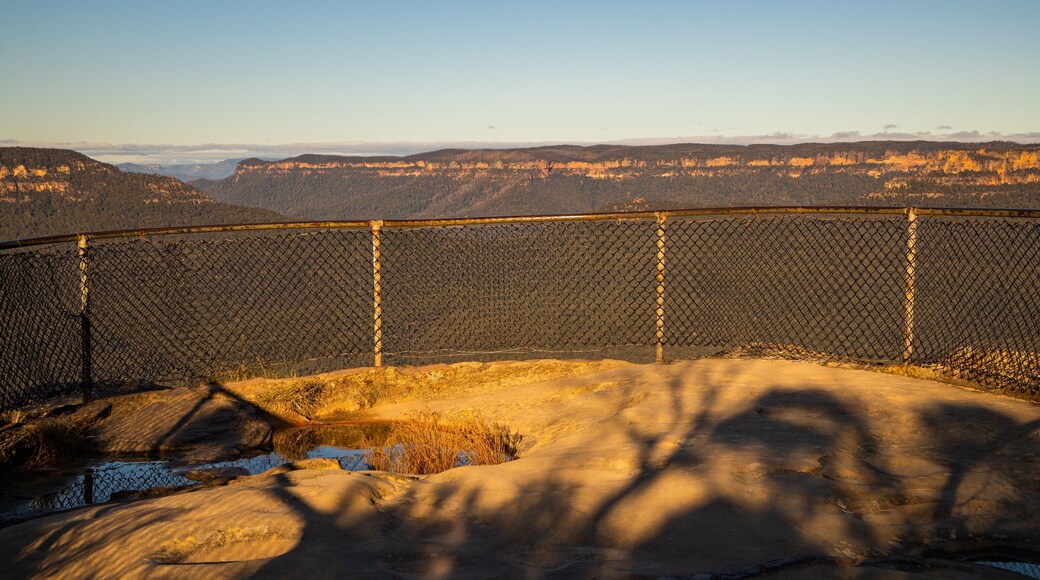 Sublime Point Lookout featuring a sunset, a gorge or canyon and landscape views