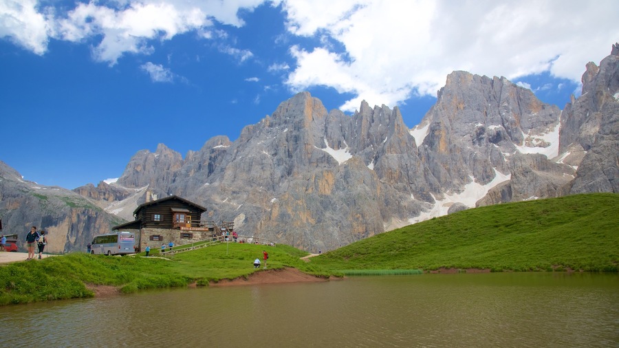 Passo Rolle showing mountains and a lake or waterhole