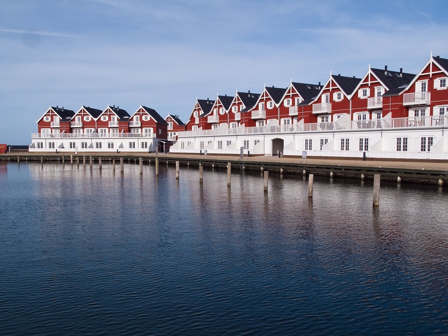 Line of modern neo classical design wooden beach summer houses Langeland Denmark