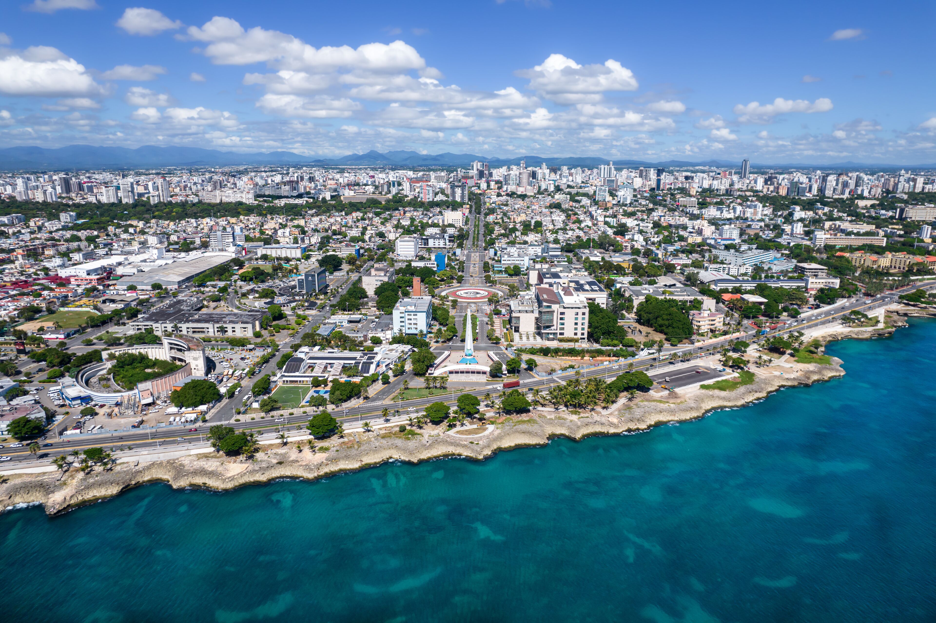 Beautiful aerial view of the city of Santo Domingo - Dominican Republic with is Parks, buildings, suburbs ,turquoise Caribbean ocean, parks and malecon