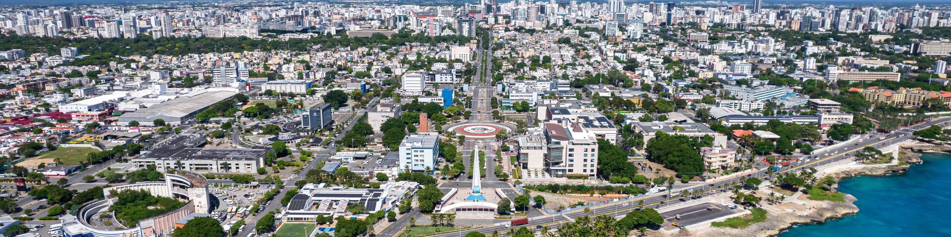 Beautiful aerial view of the city of Santo Domingo - Dominican Republic with is Parks, buildings, suburbs ,turquoise Caribbean ocean, parks and malecon