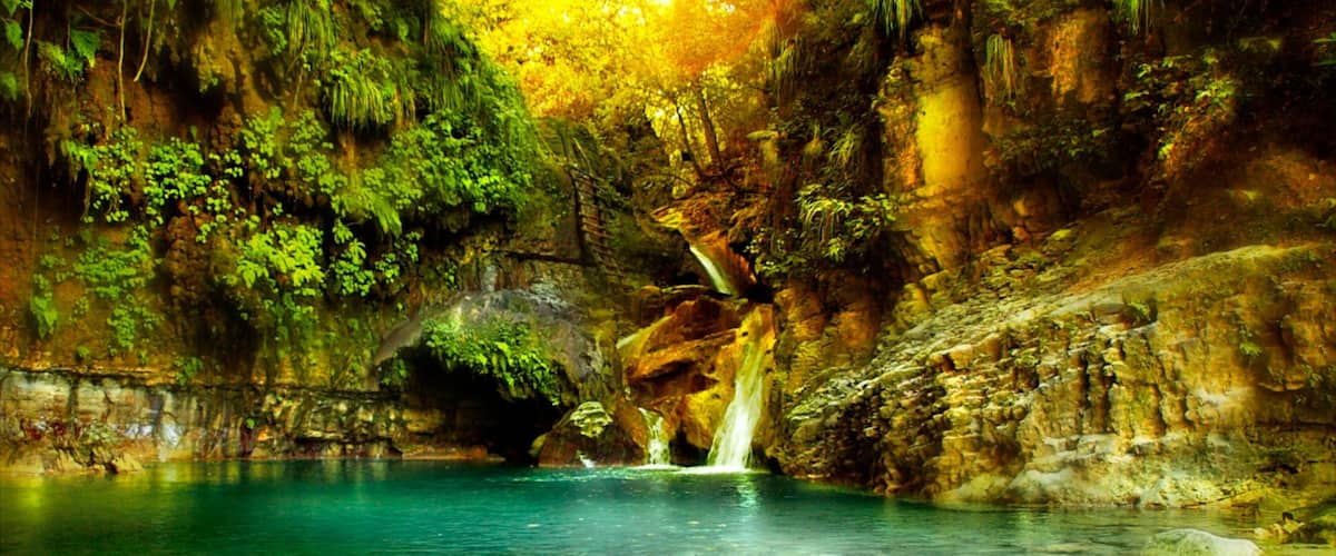 Dominicaanse Republiek toont een waterval, een meer of poel en een kloof of ravijn