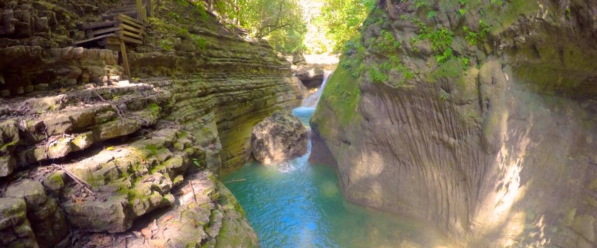27 Charcos showing a gorge or canyon and a river or creek