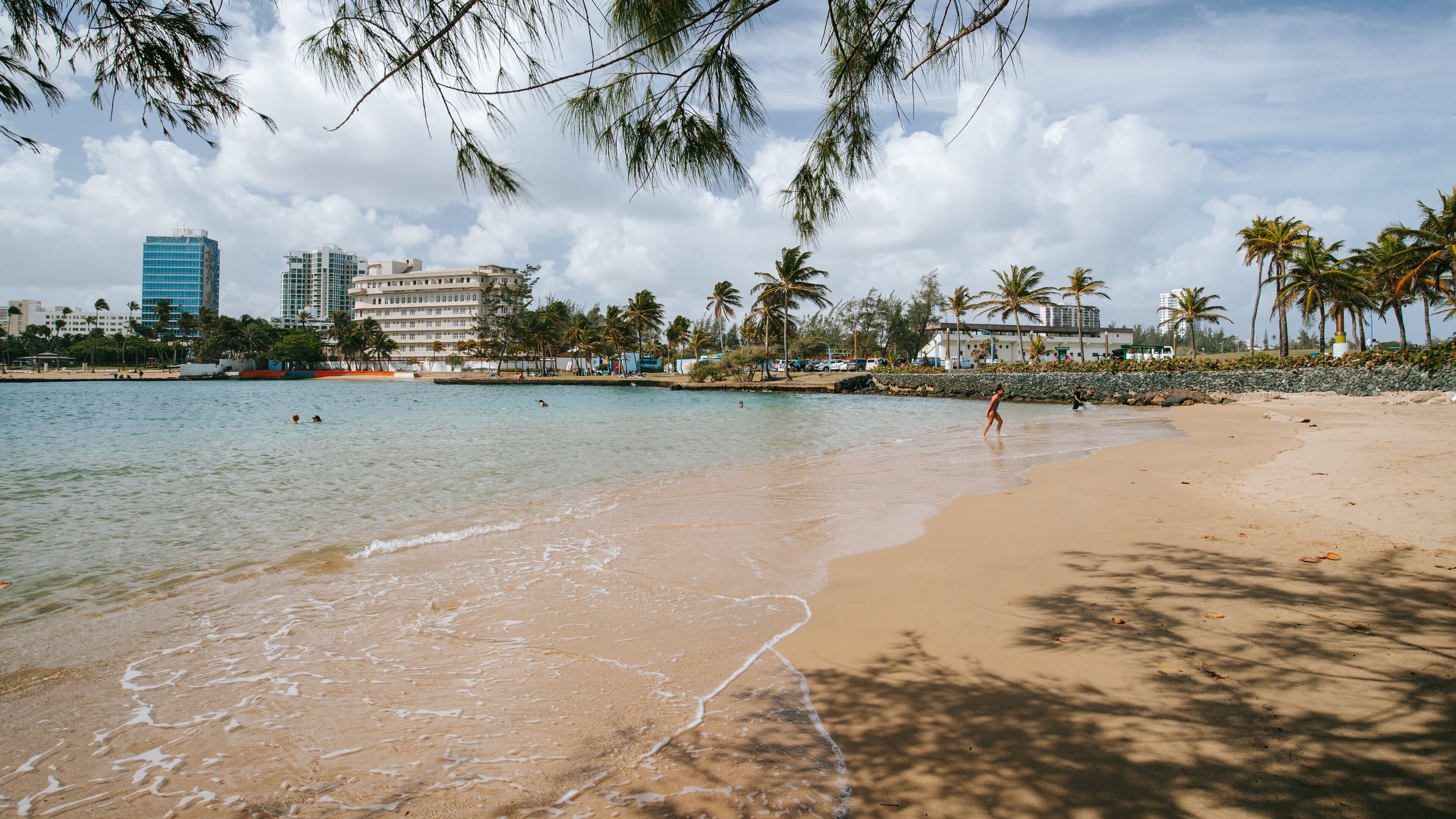 Escambron Beach featuring a sandy beach and general coastal views