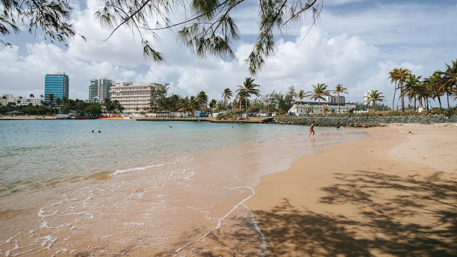 Escambron Beach featuring a sandy beach and general coastal views