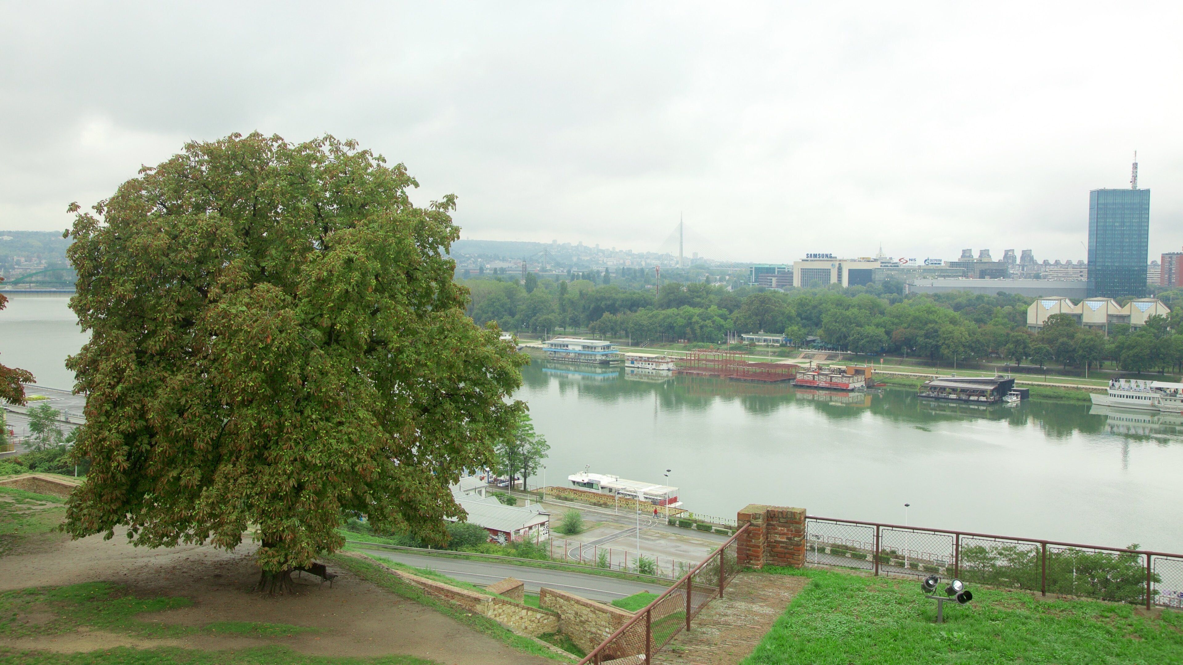 Kalemegdan Park featuring a skyscraper, a river or creek and a garden