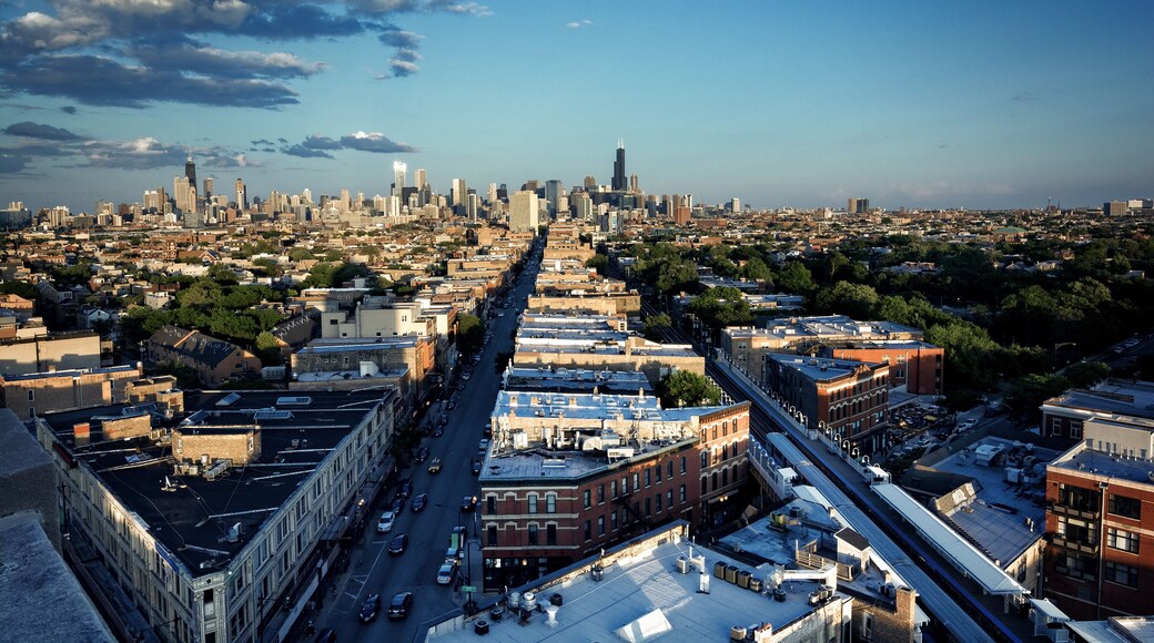 Chicago aerial skyline from the northwest side with dramatic sky and clouds.