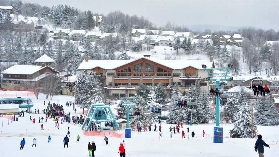 Holiday Valley Ski Area showing snow skiing, snow and a luxury hotel or resort