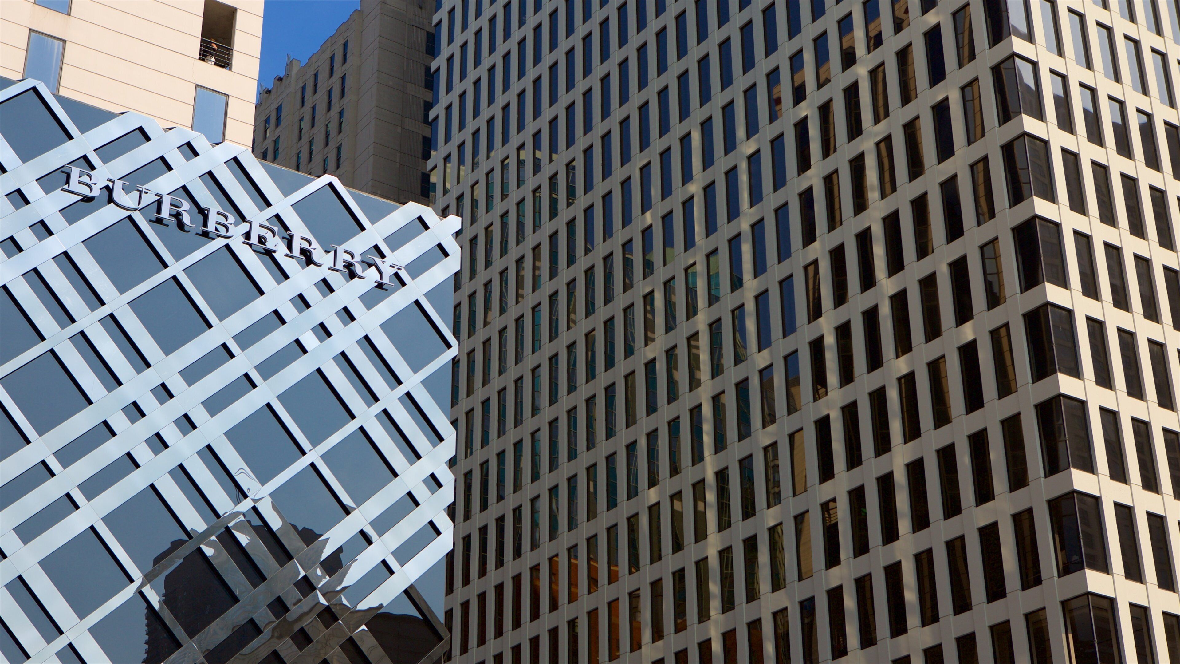 Shops at North Bridge showing signage, a city and city views