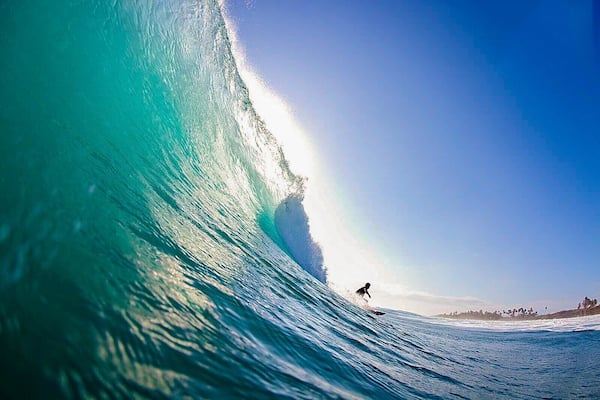 Surfing at Playa Encuentro.
Pic by https://swellsurfcamp.com