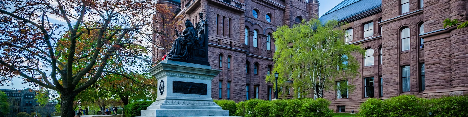 Tulips and statue outside the Legislative Assembly of Ontario, i