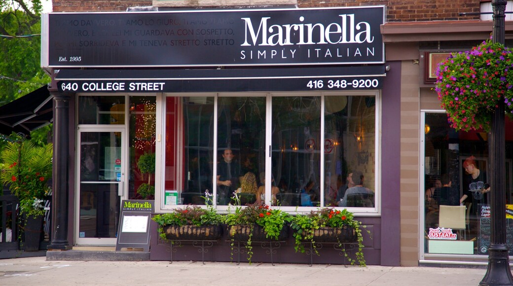 Little Italy which includes a city, signage and cafe lifestyle