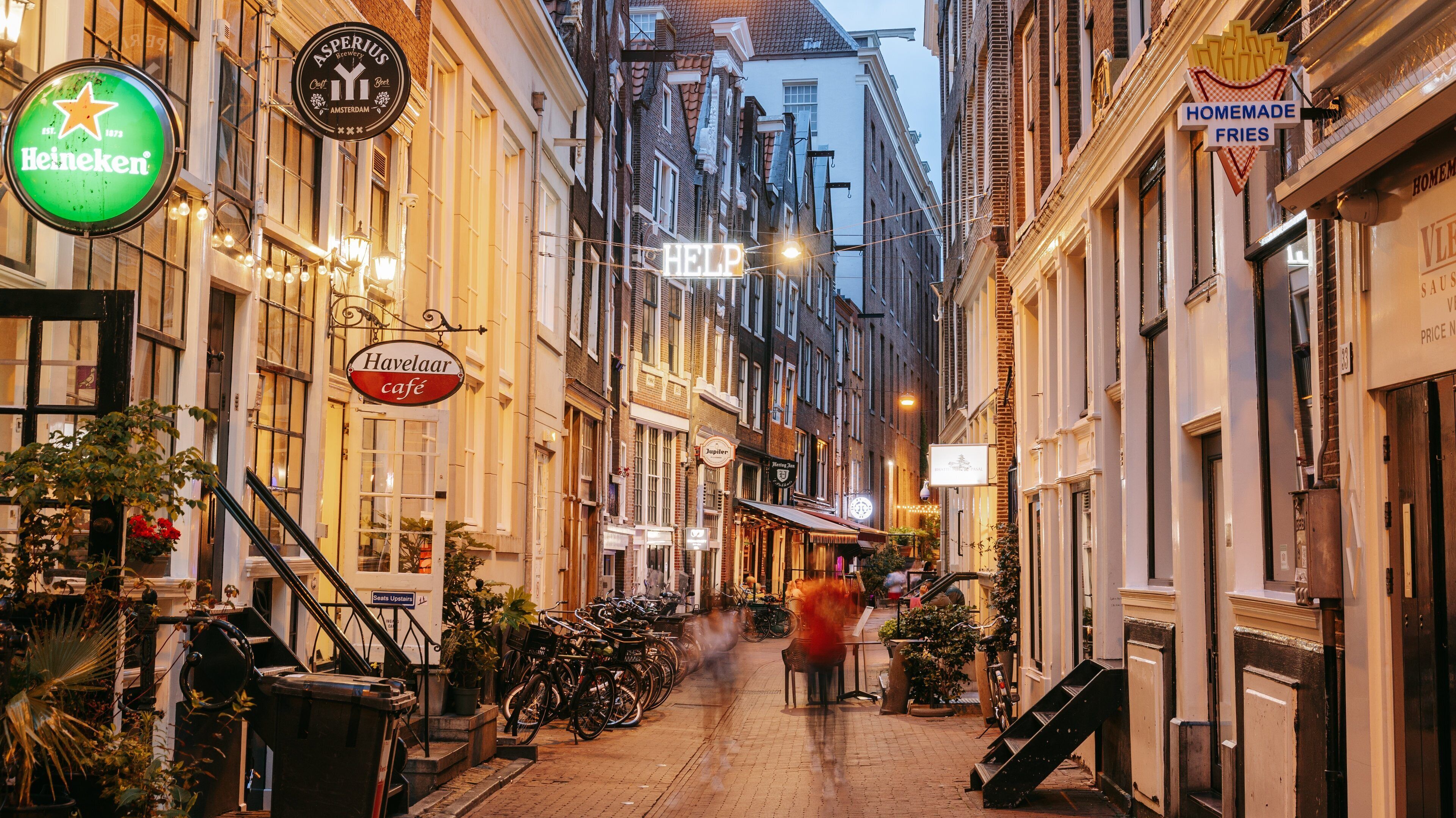 Old Town Amsterdam which includes night scenes and a city