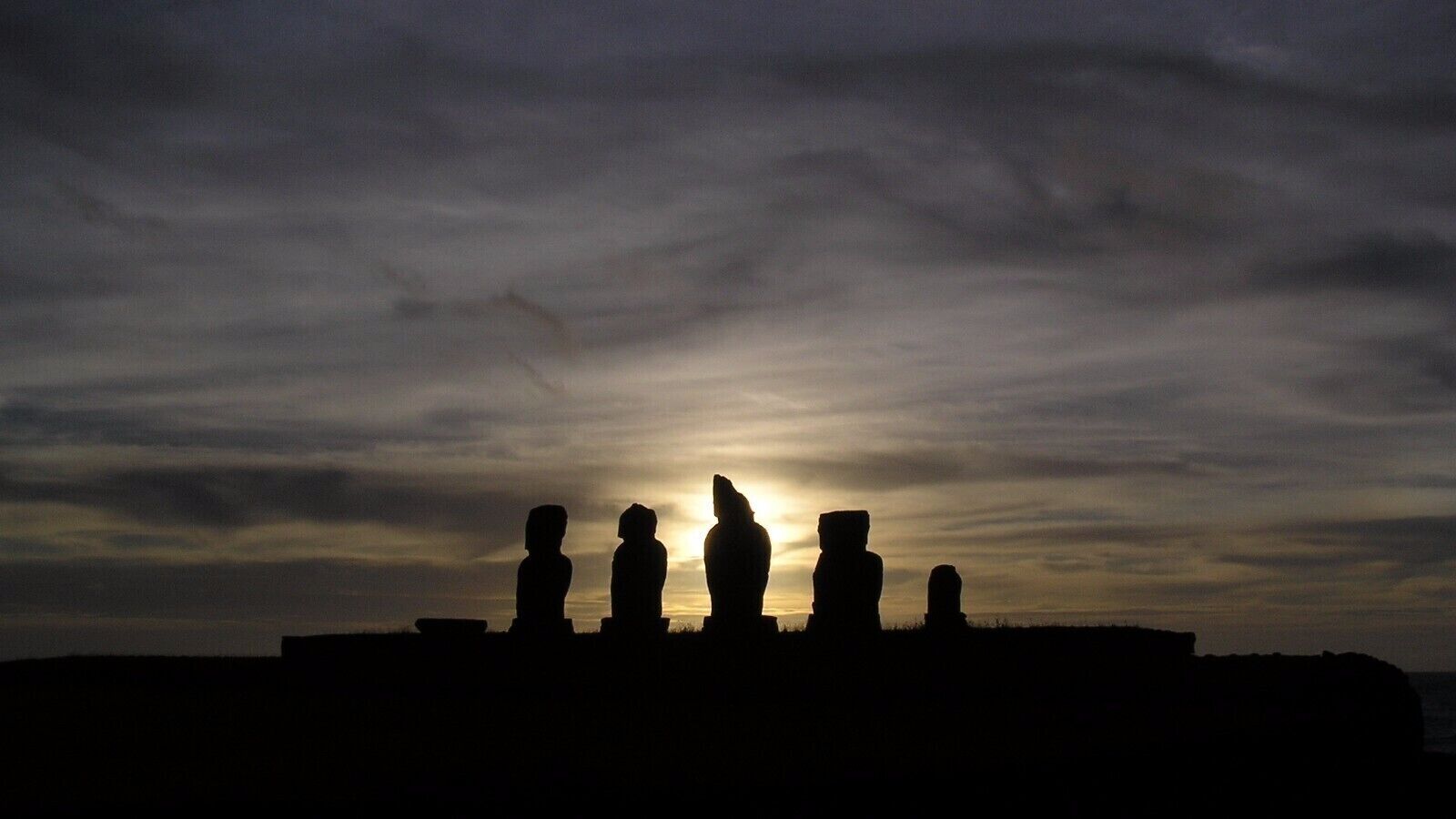 #TroveonTuesday #EasterIsland #chile #IlhaDaPascoa #GreatOutdoors #Culture #History

What to say about this island full of mysteries, mysticism and unanswered questions? What could be said to define it completely? Something about the Moais, their orientation on the altars, the people who built them, the transportation used to take them to the altars? Or something about the rocks with magnetic properties? Or something about the altars with perfectly adjusted stones resembling those of Machu Pichu? Who knows anything about their writing, still totally undeciphered, Rongo-rongo? Its location, in the middle of the Pacific Ocean, about 2000 km from any other piece of land?

Perhaps the best definition, for this island, is the one I read, I do not know where, nor written by who, saying that Easter Island is a place, far from everything and everyone, that somehow makes us closer to ourselves.

O que dizer desta ilha cheia de mistérios, misticismo e perguntas não respondidas? O que poderia ser dito que a definisse completamente? Algo sobre os Moais, a sua orientação sobre os altares, o povo que os construiu, o transporte utilizado para os levar até aos altares? Ou algo sobre as pedras com propriedades magnéticas? Ou ainda algo sobre os altares com pedras perfeitamente ajustadas lembrando as de Machu Pichu? Quem sabe algo sobre a escrita, ainda indecifrada totalmente, Rongo-rongo? A sua localização, no meio do Oceano Pacífico, a cerca de 2000 km de qualquer outro pedaço de terra? 

Talvez a melhor definição, para esta ilha, seja a que eu li, não sei aonde, nem escrita por quem, que dizia que a Ilha de Páscoa é um lugar, longe de tudo e de todos, que, de alguma forma, nos torna mais próximos de nós mesmos.