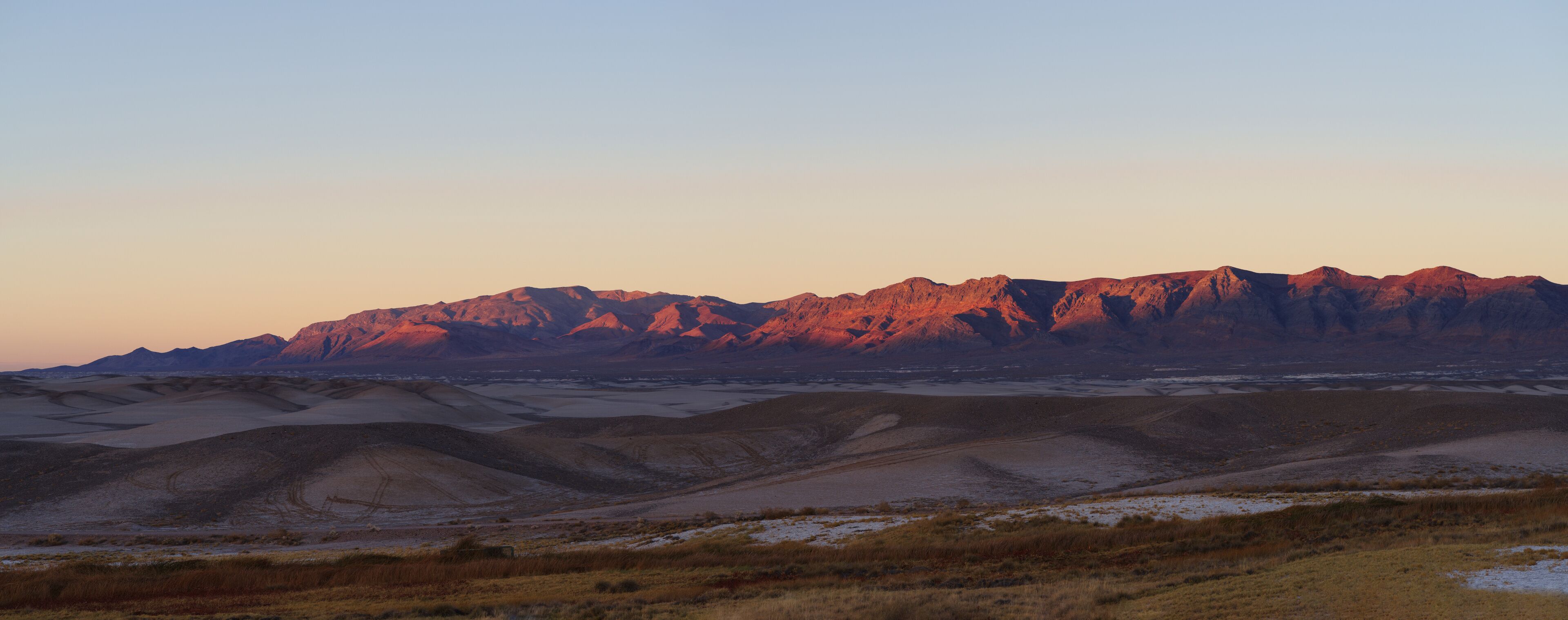 Tecopa Hot Springs and Hills area in Inyo County, CA. Panoramic image taken at dusk.