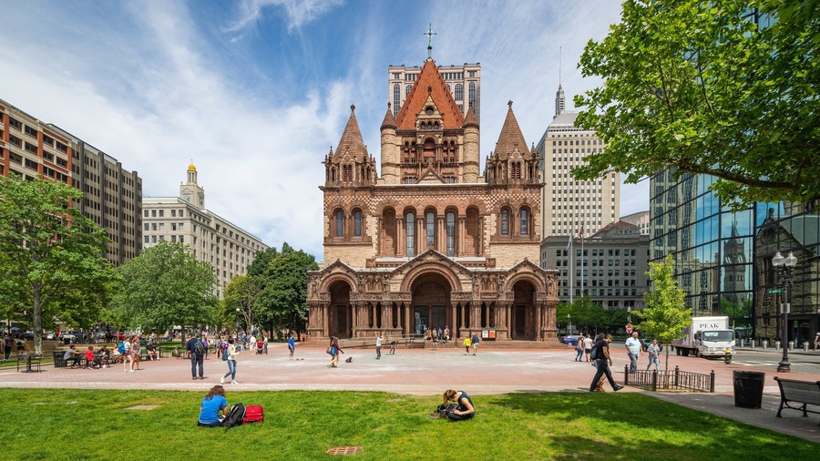 Trinity Church Boston showing heritage architecture, a city and a garden