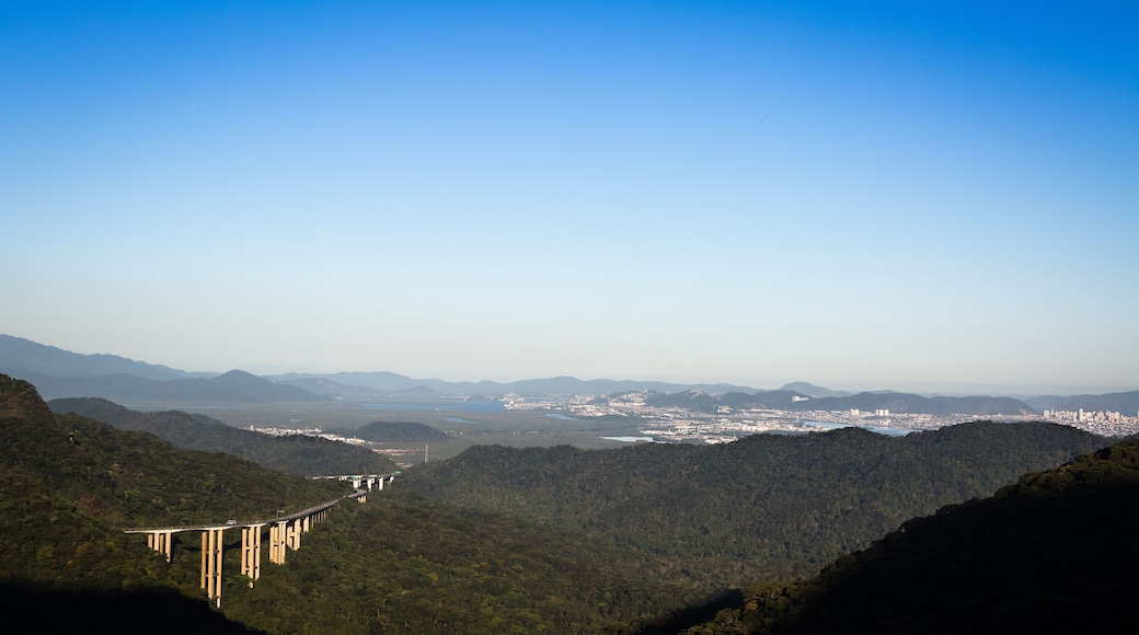 View from the top of Serra do Mar with the Imigrantes Highway highlighted and in the background the city of Santos, São Vicente, Brazil.