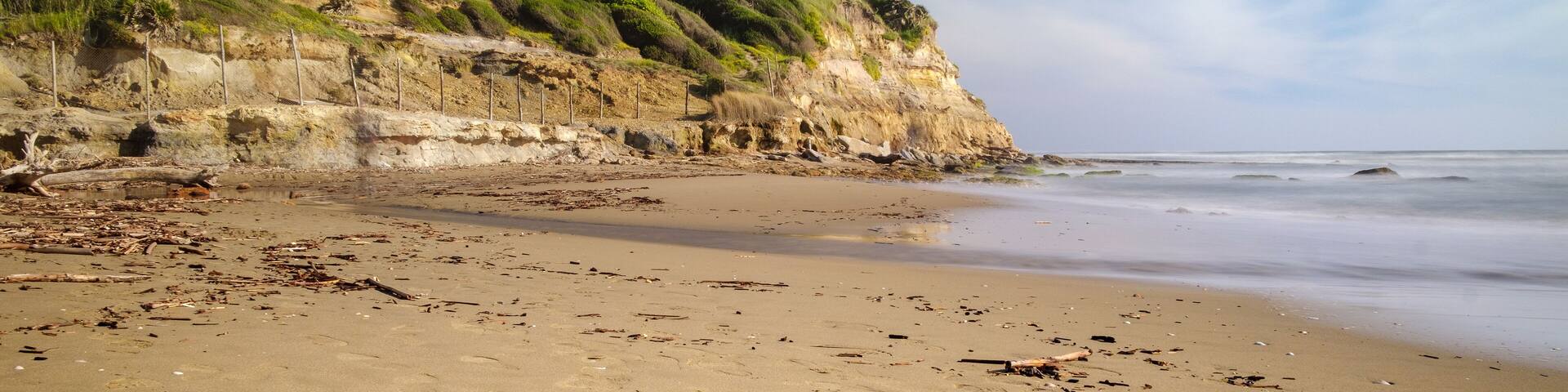 Sand beach of natural reserve Tor Caldara during sunset , Lavinio , Anzio , Rome , Italy