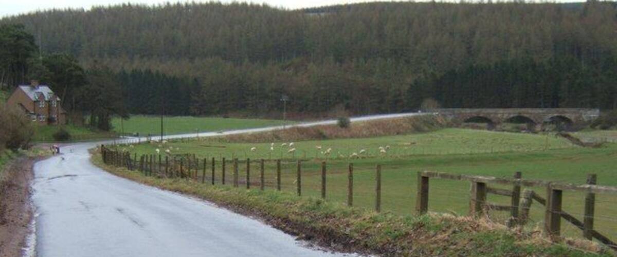 Bridge over the Whiteadder Near Ellemford, showing the B6355's descent before it bends to the right and crosses the bridge over the River Whiteadder.