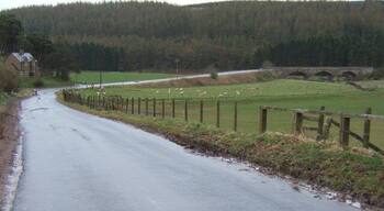 Bridge over the Whiteadder Near Ellemford, showing the B6355's descent before it bends to the right and crosses the bridge over the River Whiteadder.