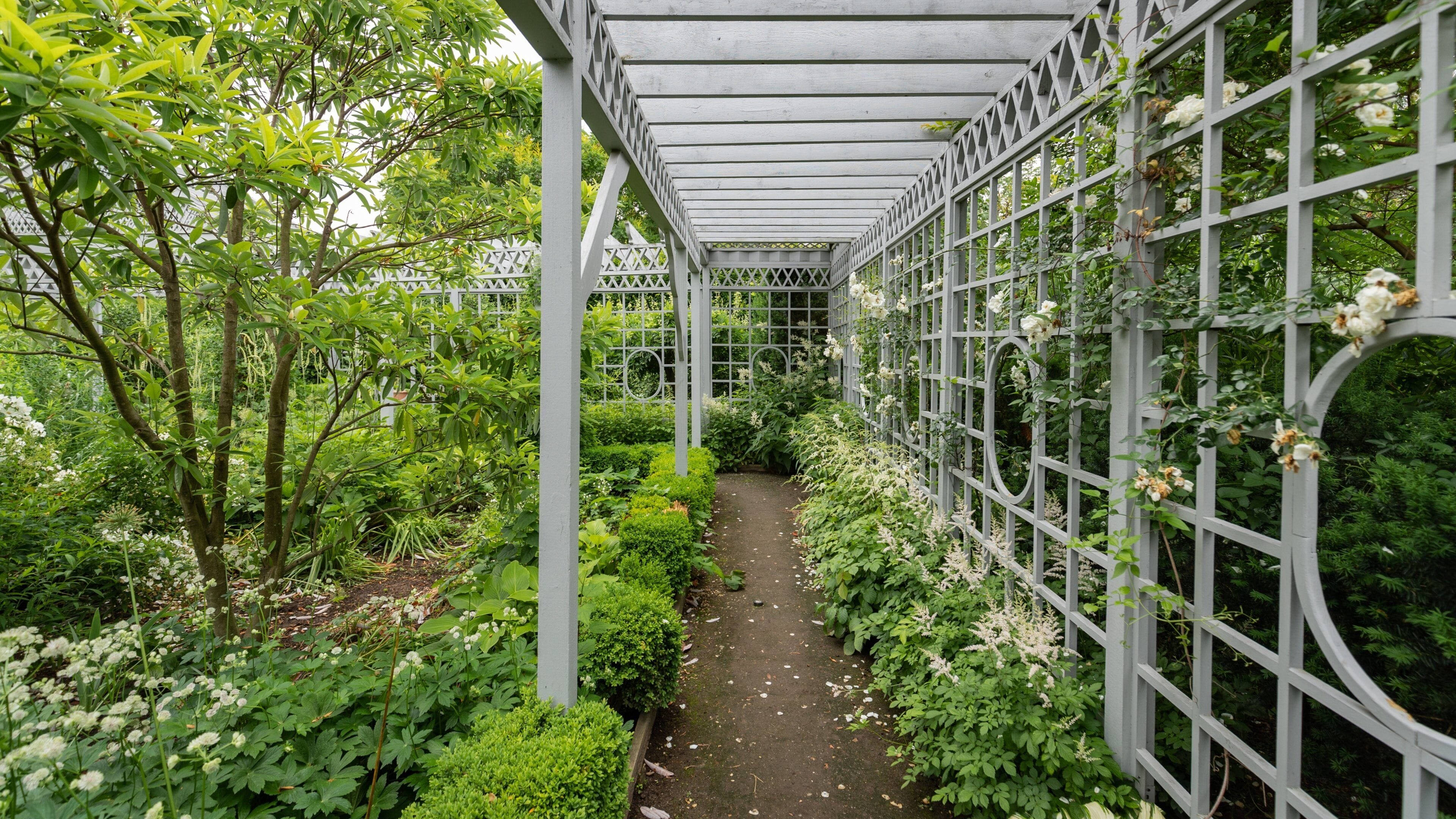 Snug Harbor Cultural Center and Botanical Garden showing interior views and a garden