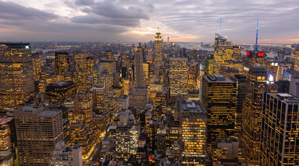 Top of the Rock featuring landscape views, a sunset and a city