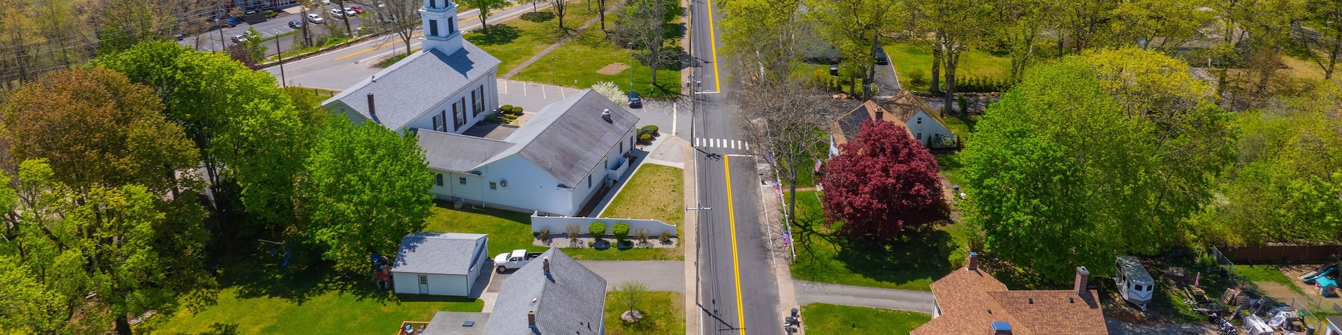 Congregational Church aerial view on Village Green in historic village of Slatersville, town of North Smithfield, Rhode Island RI, USA.
